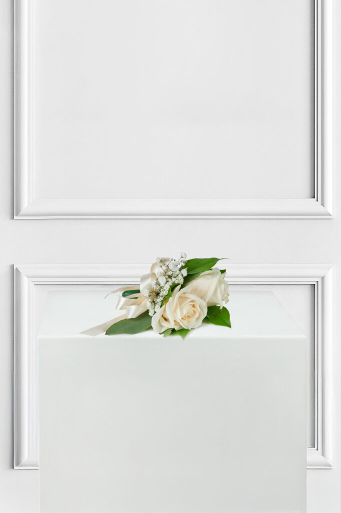 Double White Rose Wrist Corsage by North Park Florist.